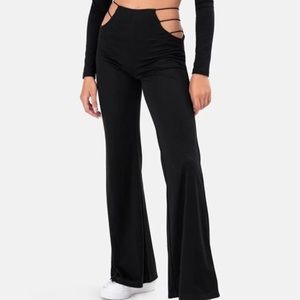 Bell bottom pants with cut outs on the side